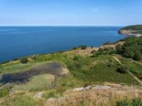 Blick von äußerer Hammerhus Burgmauer zur Ostsee mit Hammer Havn Bucht